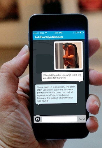 A visitor using ASK Brooklyn Museum in the gallery