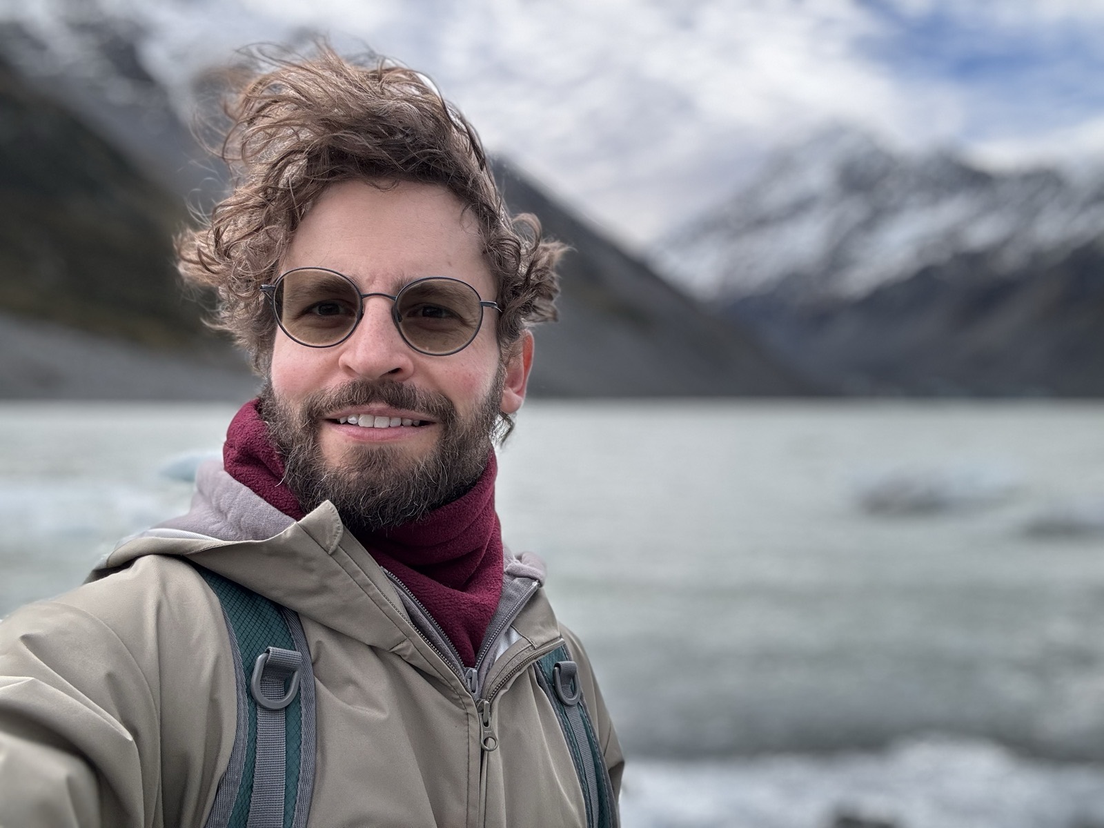 Igor Gembitsky in front of a glacier lake